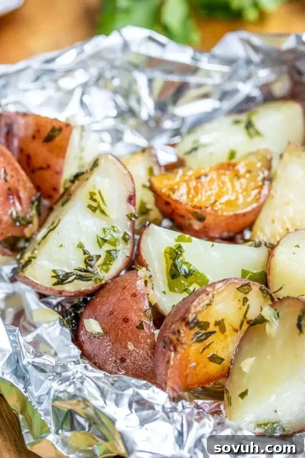 Perfectly Cooked Garlic Herb Potatoes Cooked Foil Packet Garlic Potatoes, tender and ready to serve