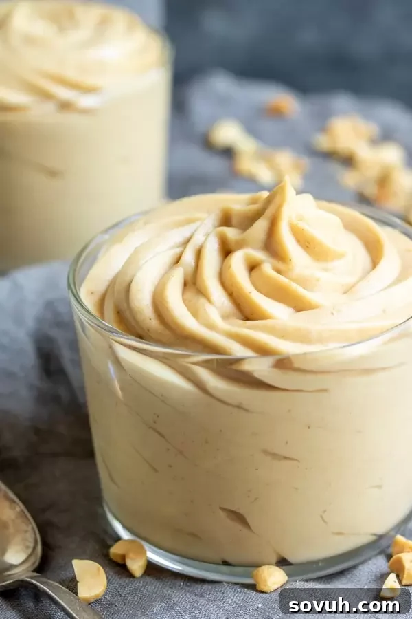 easy to make Keto Peanut Butter Mousse with a decorative chocolate drizzle