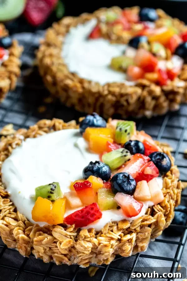 Close-up of a Granola Fruit Tart, emphasizing the creamy yogurt filling and the healthy granola crust