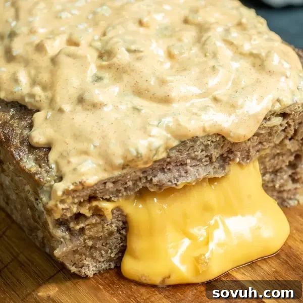 Big Mac Keto Meatloaf oozing cheese