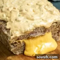 Big Mac Keto Meatloaf oozing cheese