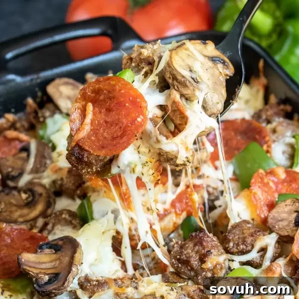 Low Carb Pizza Casserole is the perfect keto dinner for the family, topped with pepperoni, sausage, and cheese