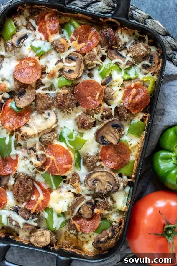 Serving of Low Carb Pizza Casserole, a easy family dinner with melted cheese and rich toppings
