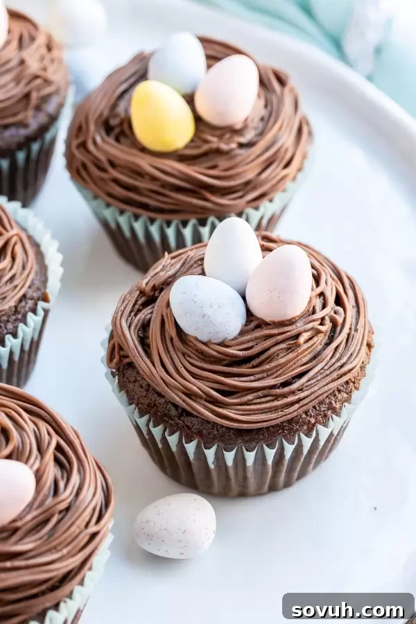 Bird’s Nest Easter Cupcakes on a decorative plate, ready for Easter dessert
