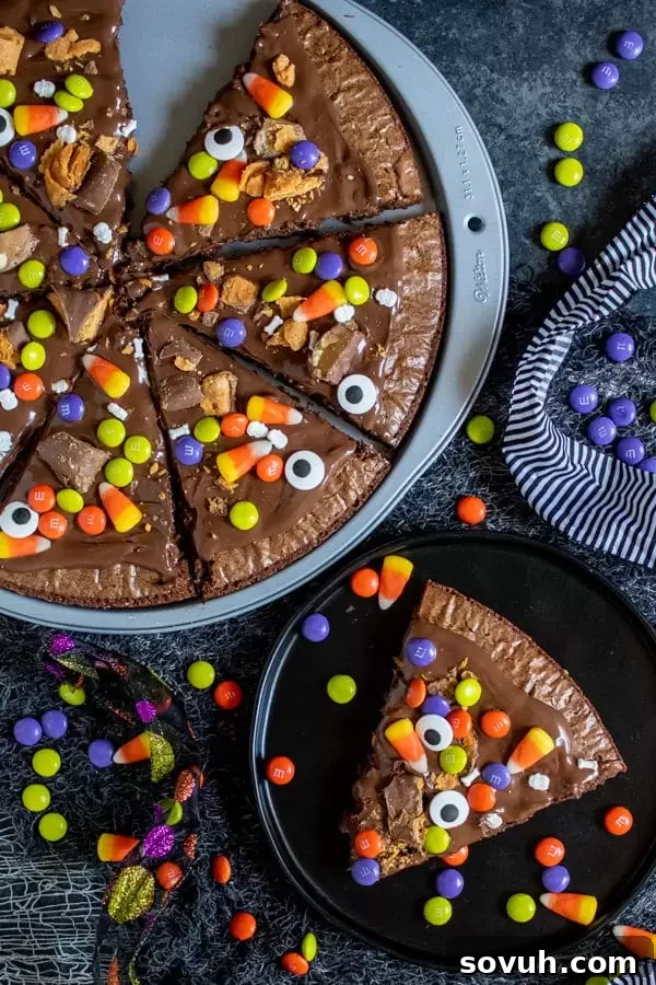 Close-up of Halloween Dessert Pizza with various candies, ready to be served