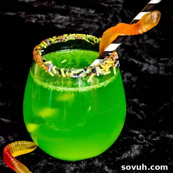 A ghoulish green Kids Halloween punch, creatively made with ginger ale.