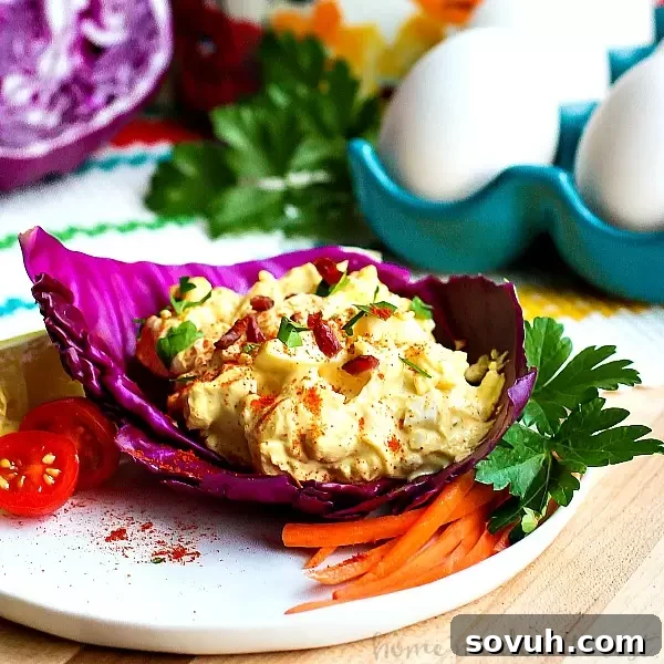 Bacon Cheddar Egg Salad | Need something to do with those Easter leftovers? This Bacon Cheddar Egg Salad is a low carb recipe that uses up all of those hard-boiled eggs you have leftover from Easter. Bacon Cheddar Egg Salad combines bacon, eggs, and cheddar cheese to make an easy Easter brunch recipe or a low carb recipe you can take for lunch or make for dinner all year long.