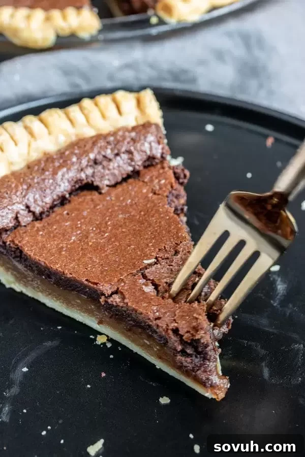 Enjoying a slice of Chocolate Chess Pie with a fork
