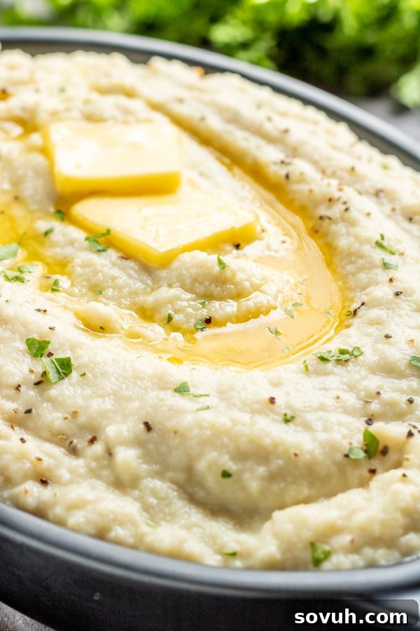 Deliciously creamy low carb cauliflower mash, perfect as a keto-friendly Thanksgiving side.