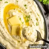 creamy cauliflower mash on a spoon