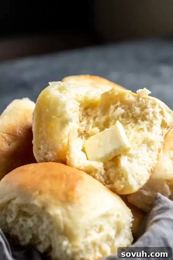 A close-up of buttery, easy-to-make Overnight Refrigerator Yeast Rolls, perfect for holiday gatherings.