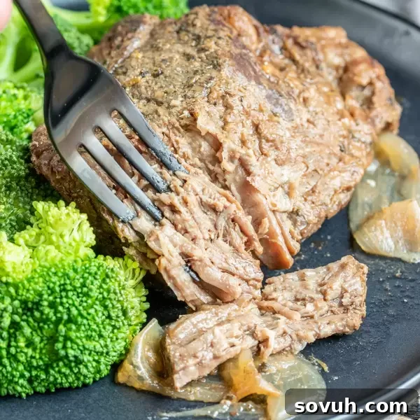 Succulent and juicy Instant Pot Roast Beef, ready to be served.