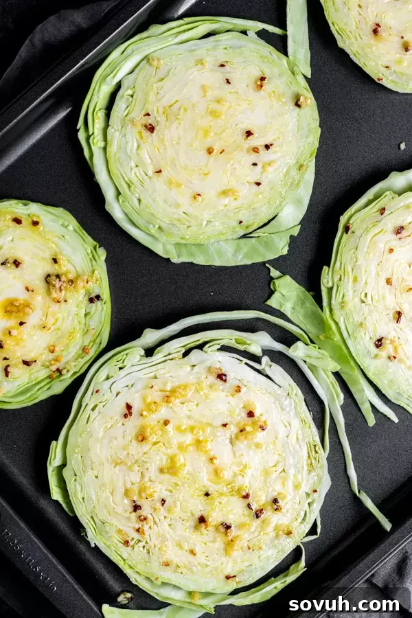 Step-by-step guide on how to make Oven Roasted Cabbage Steaks, showing seasoned slices