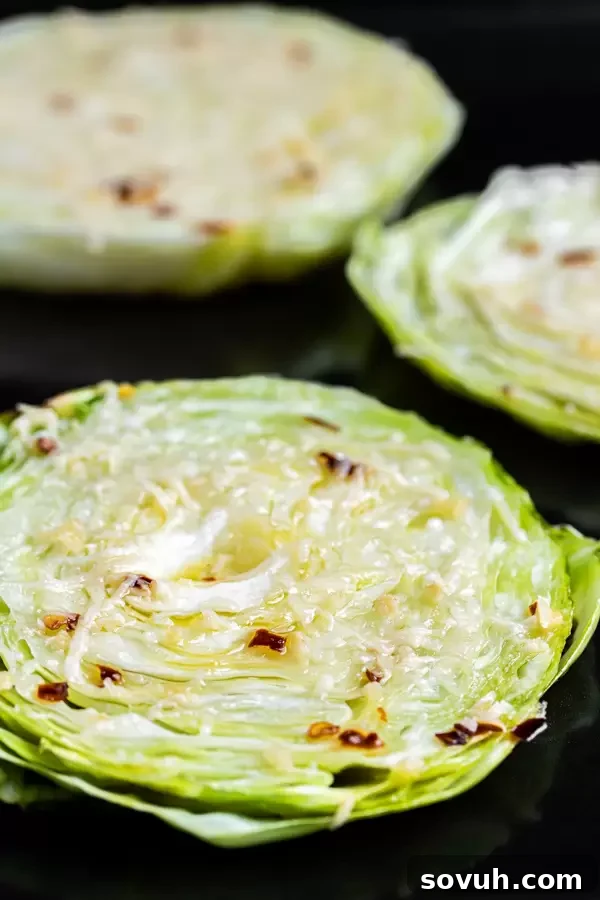 Roasted Cabbage Steaks: An easy keto and low carb side dish recipe on a baking sheet