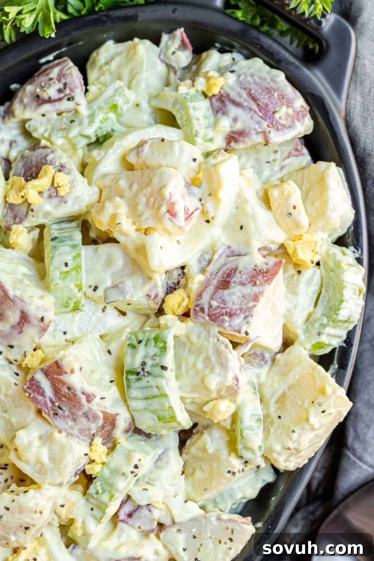 Mustard Potato Salad in black oblong dish