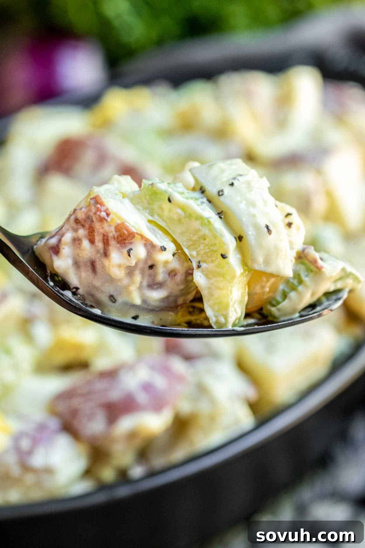 black spoon with Mustard Potato Salad