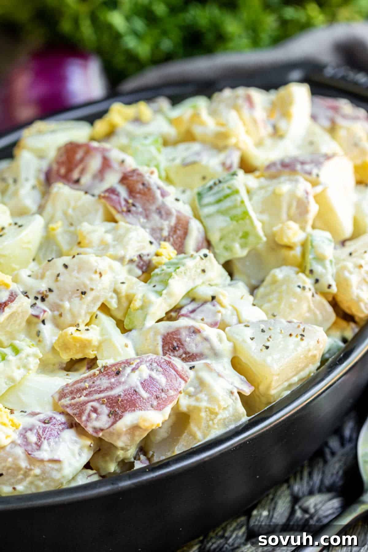 Mustard Potato Salad in black oblong dish