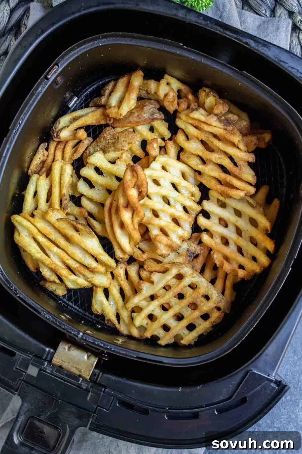 waffle Air Fryer Frozen French Fries in air fryer basket