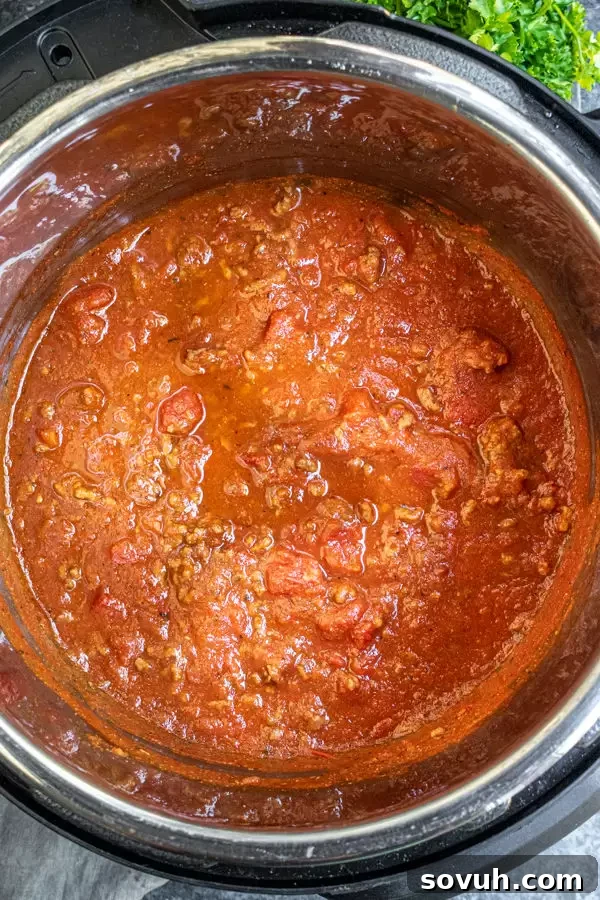 Instant Pot Spaghetti Sauce cooking inside the pressure cooker
