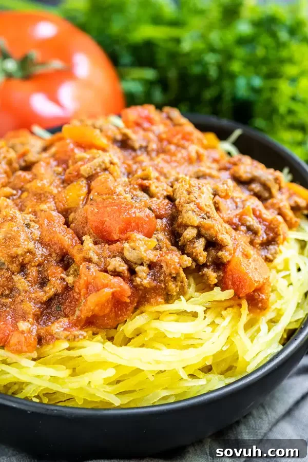 Instant Pot Spaghetti Sauce served over Instant Pot Spaghetti Squash for a keto meal