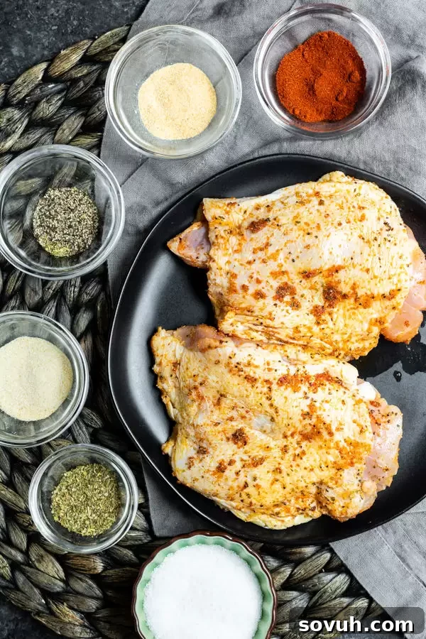 Crispy Air Fryer Chicken Thighs 3 Ingredients to make Air Fryer Chicken Thighs, including chicken, olive oil, and various spices.