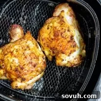 Crispy Air Fryer Chicken Thighs 7 Air Fryer Chicken Thighs in air fryer basket
