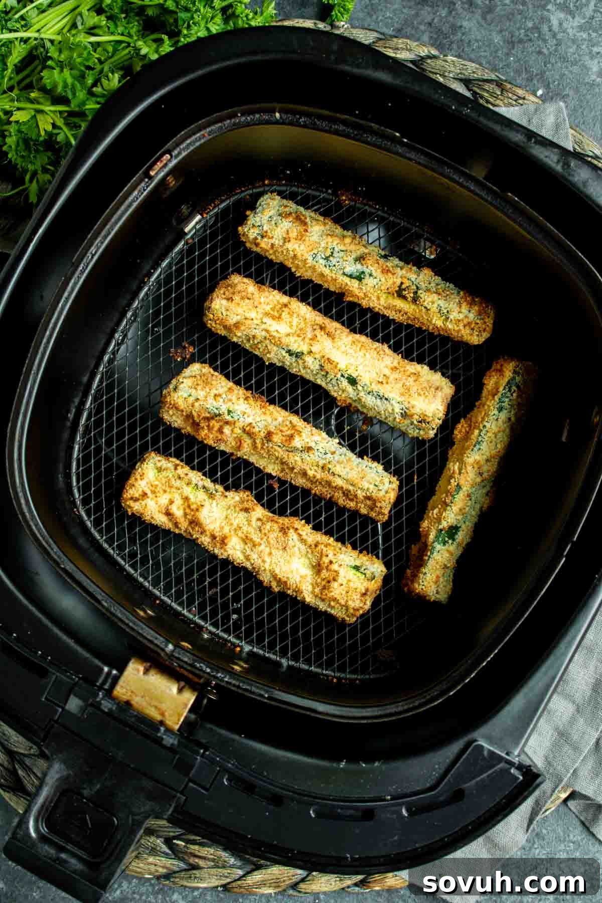 Air Fryer Zucchini in air fryer basket