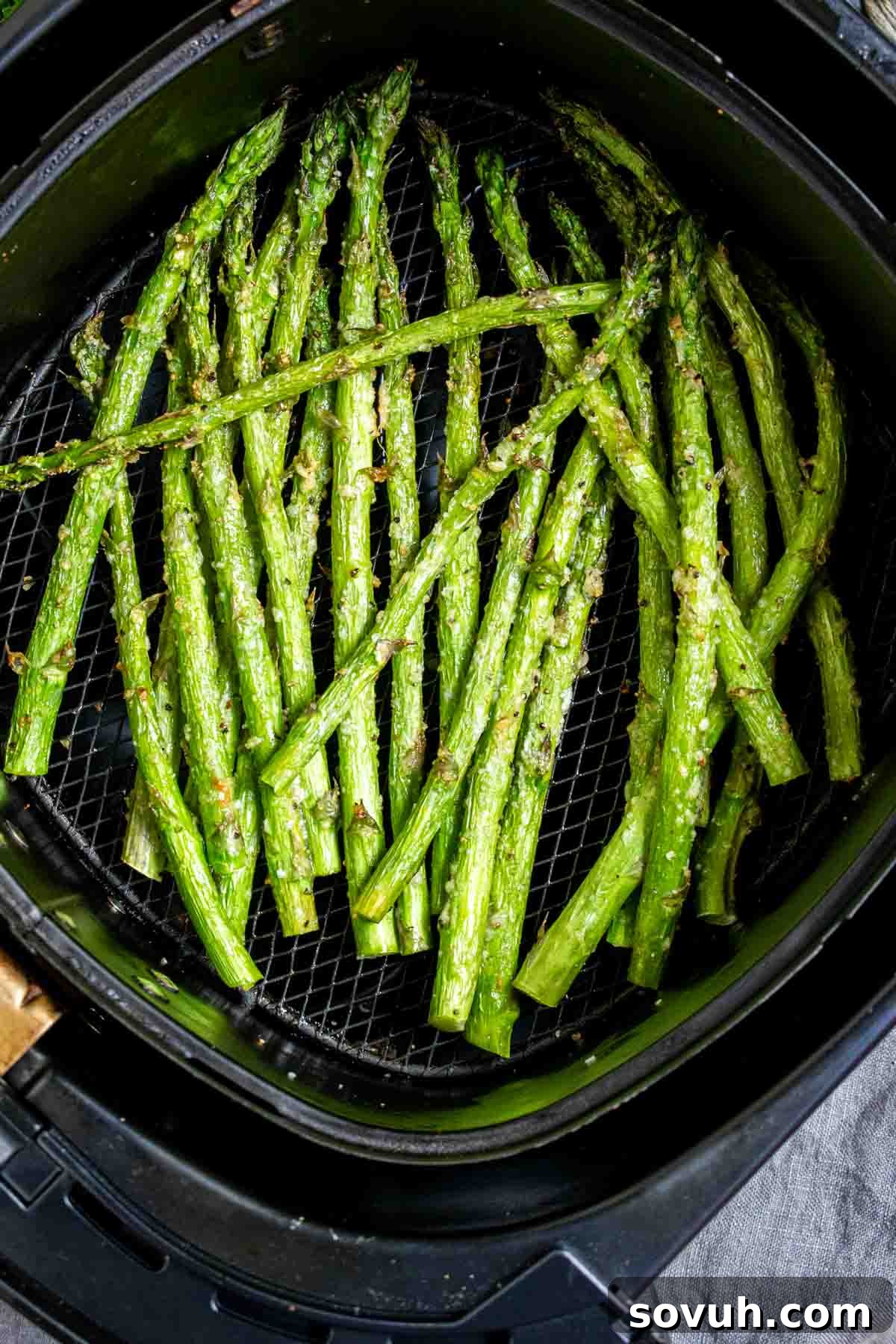 Air Fryer Asparagus in an air fryer.