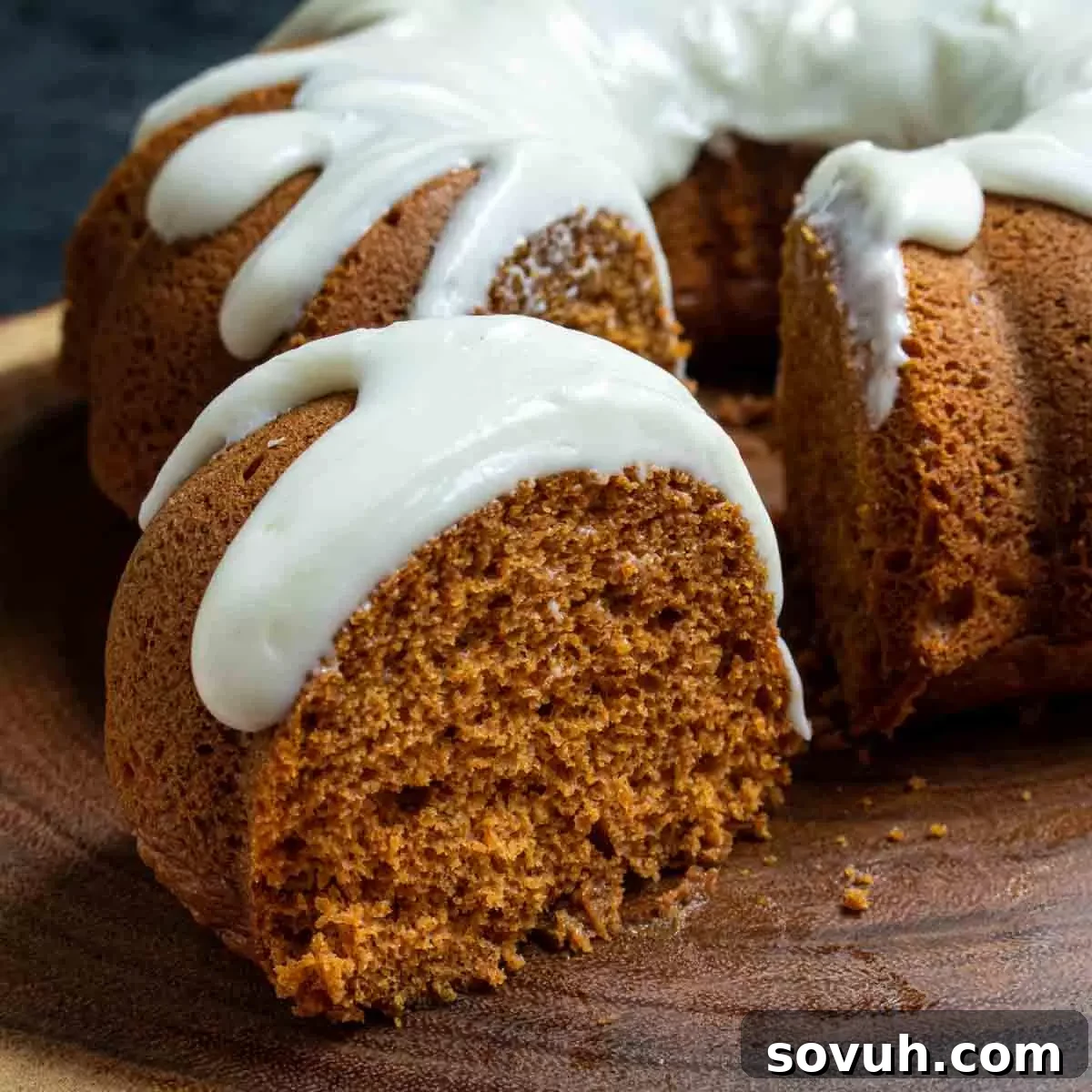 slice of cream cheese frosted Pumpkin Bundt Cake