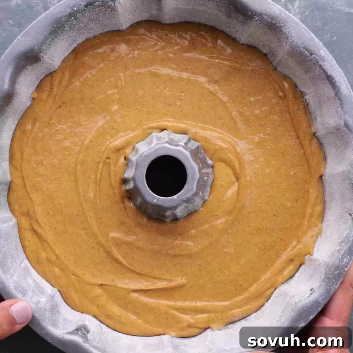 pumpkin bundt cake batter in pan