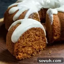 slice of cream cheese frosted Pumpkin Bundt Cake