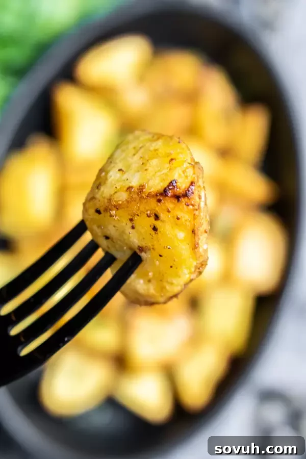 Crispy Air Fryer Potatoes on a fork