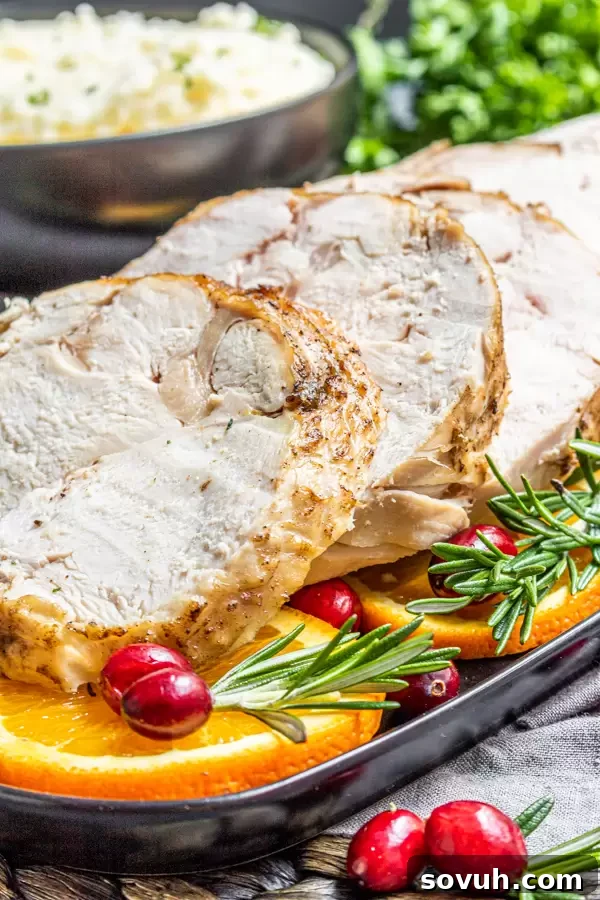 A perfectly cooked and optionally browned Instant Pot Turkey Breast with golden, crispy skin, sliced and ready to serve.