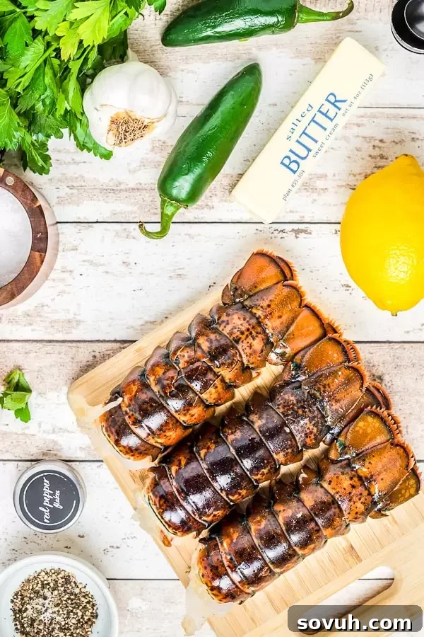 Close-up photo showing how to prepare broiled lobster tails, with the meat separated from the shell and butterflied