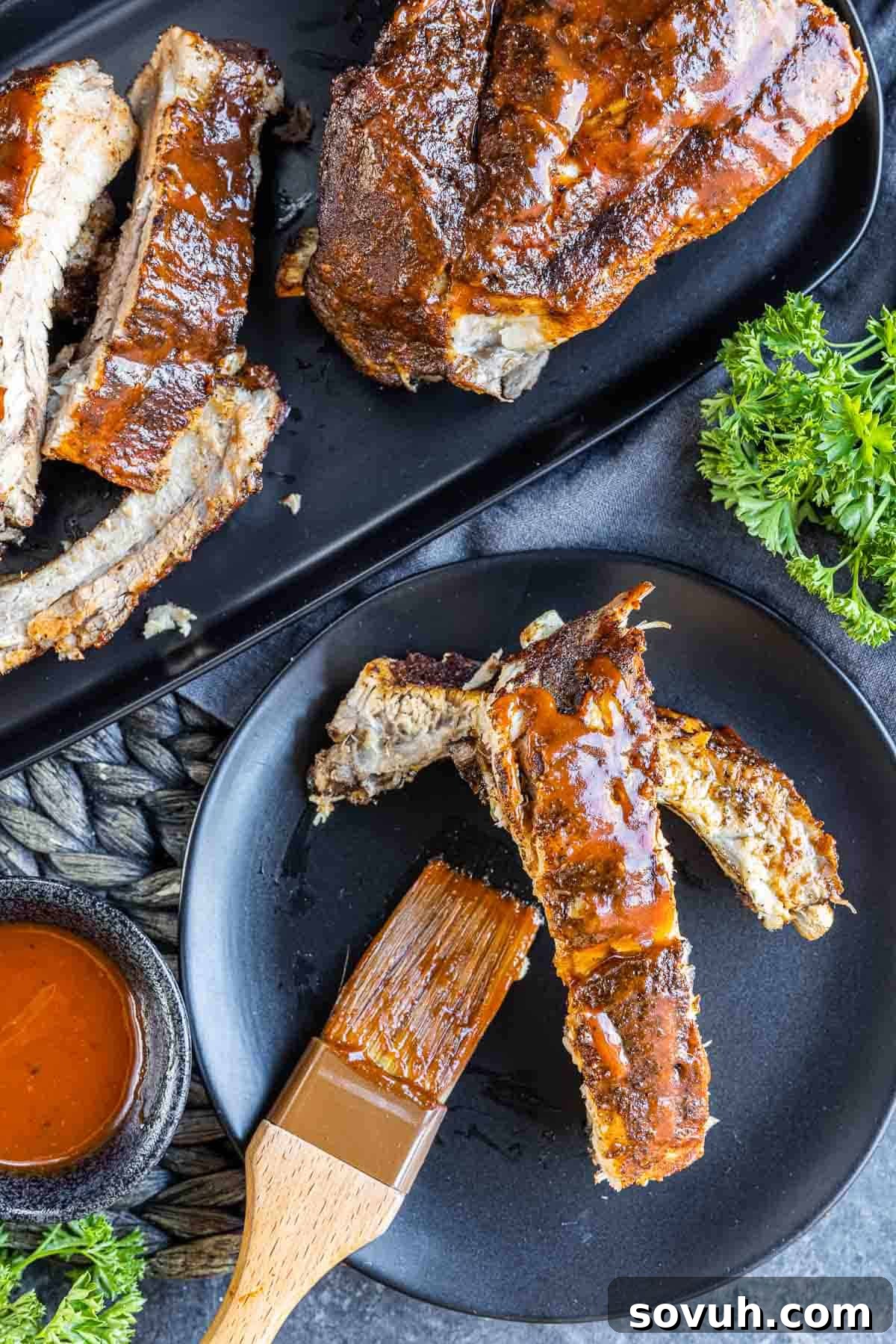 Instant Pot Ribs on a plate with a brush