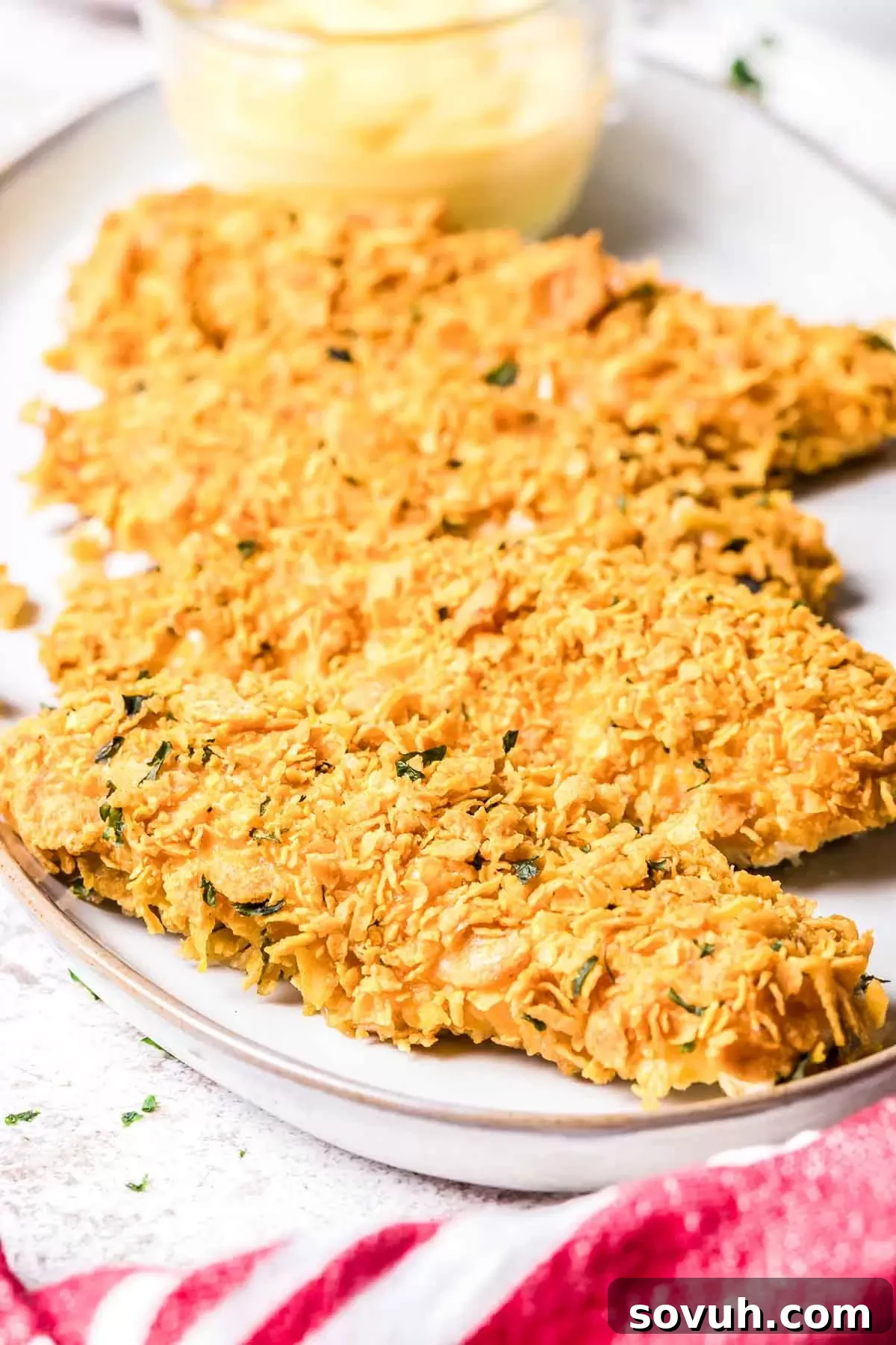 Cornflake Chicken tender on a plate