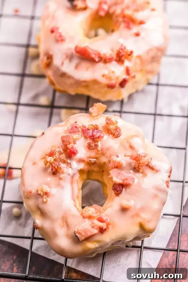 Air Fryer Maple Bacon Donuts with a bacon crumble