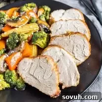 sliced Air Fryer Pork Tenderloin on a plate