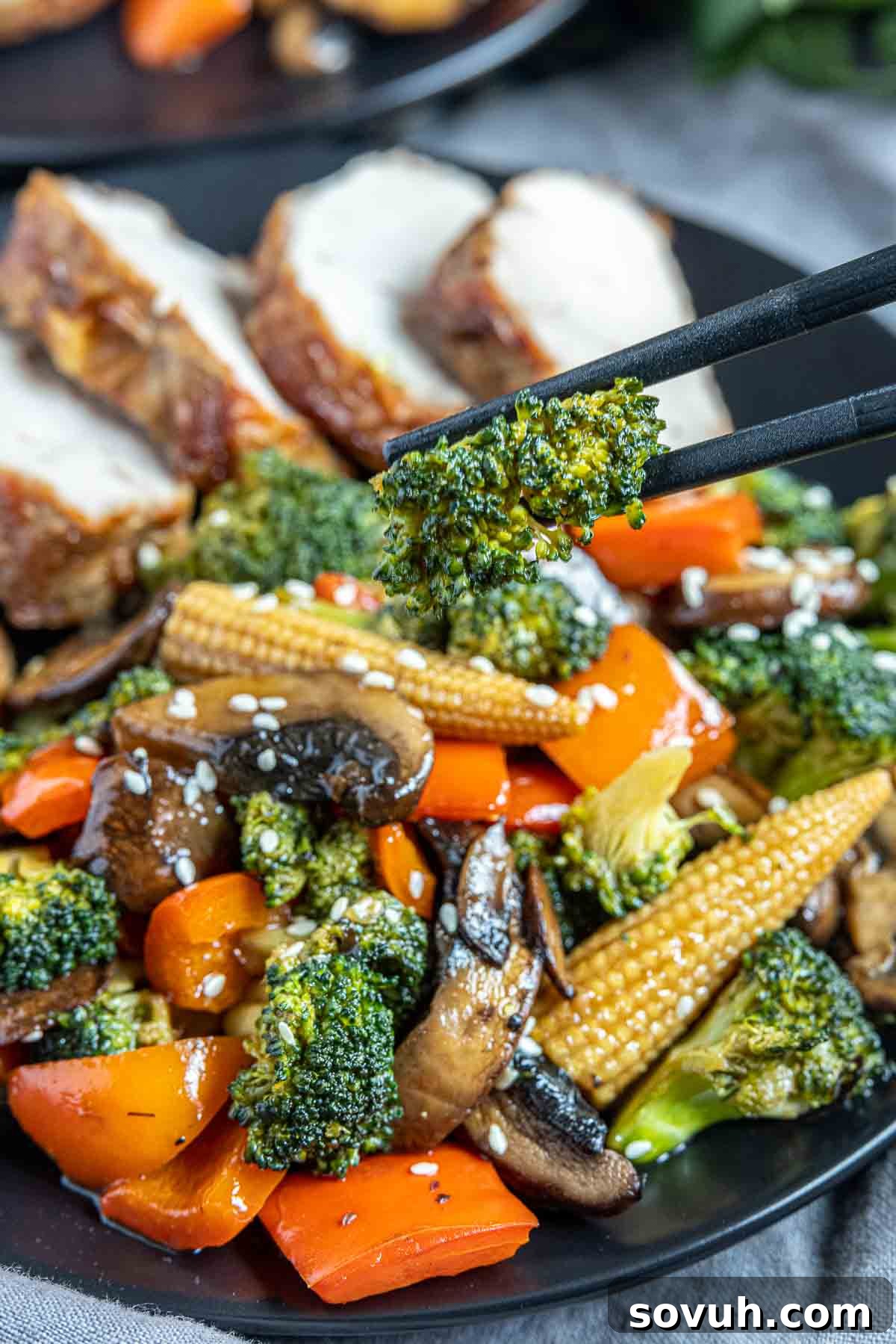 chopsticks holding Vegetable Stir Fry