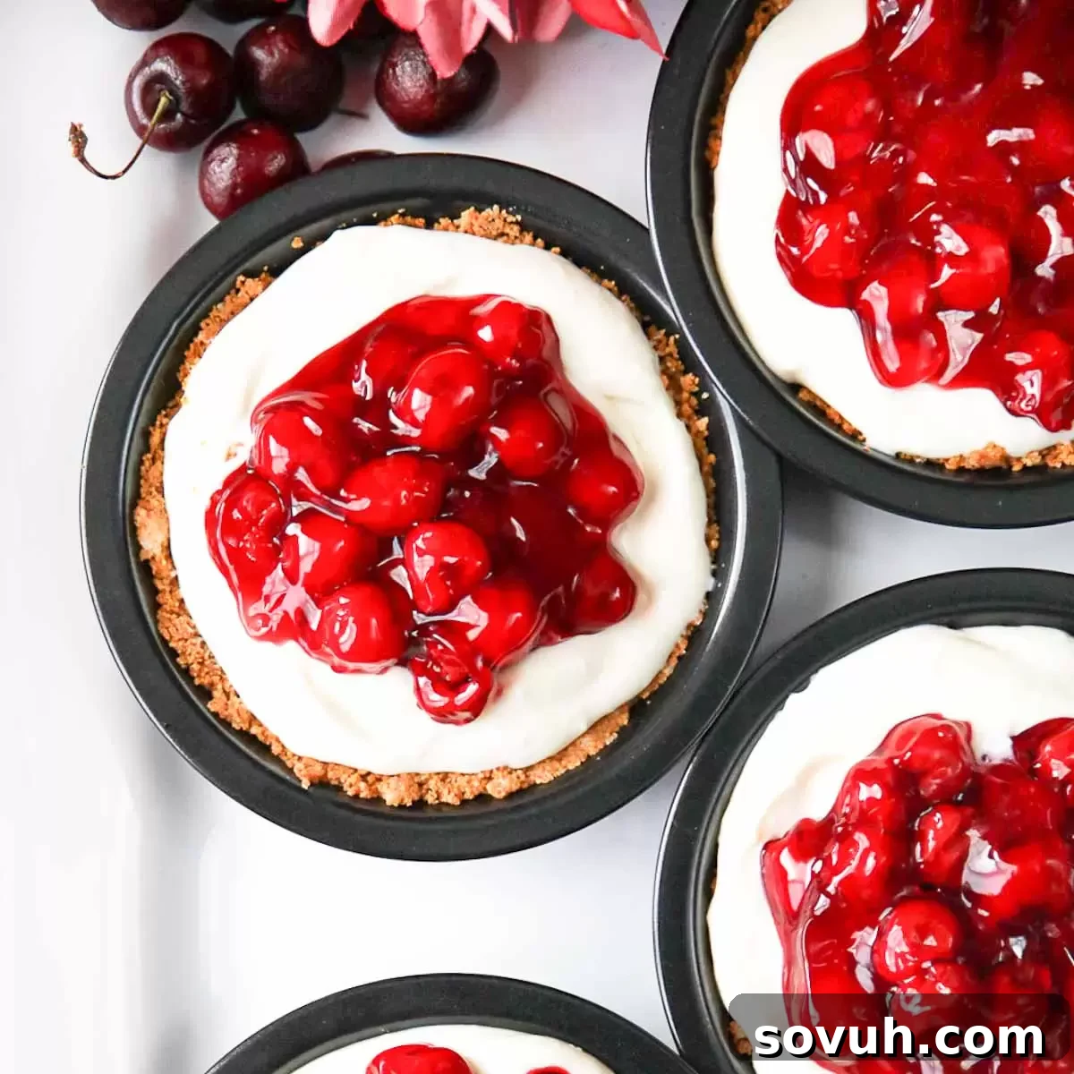 Individual size No Bake Cherry Cheesecake, a perfect easy dessert for summer gatherings.