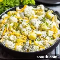 Keto Dill Pickle Salad in a black bowl