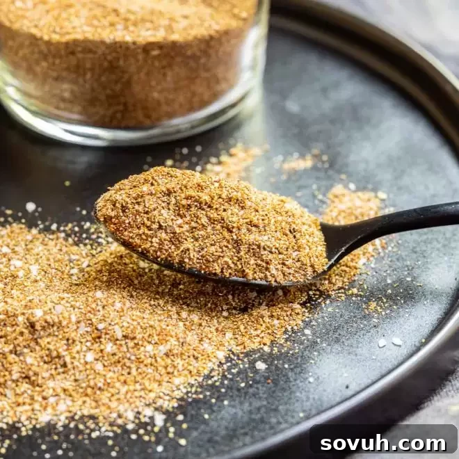 Homemade Fajita Seasoning on a spoon, ready to be used in delicious dishes