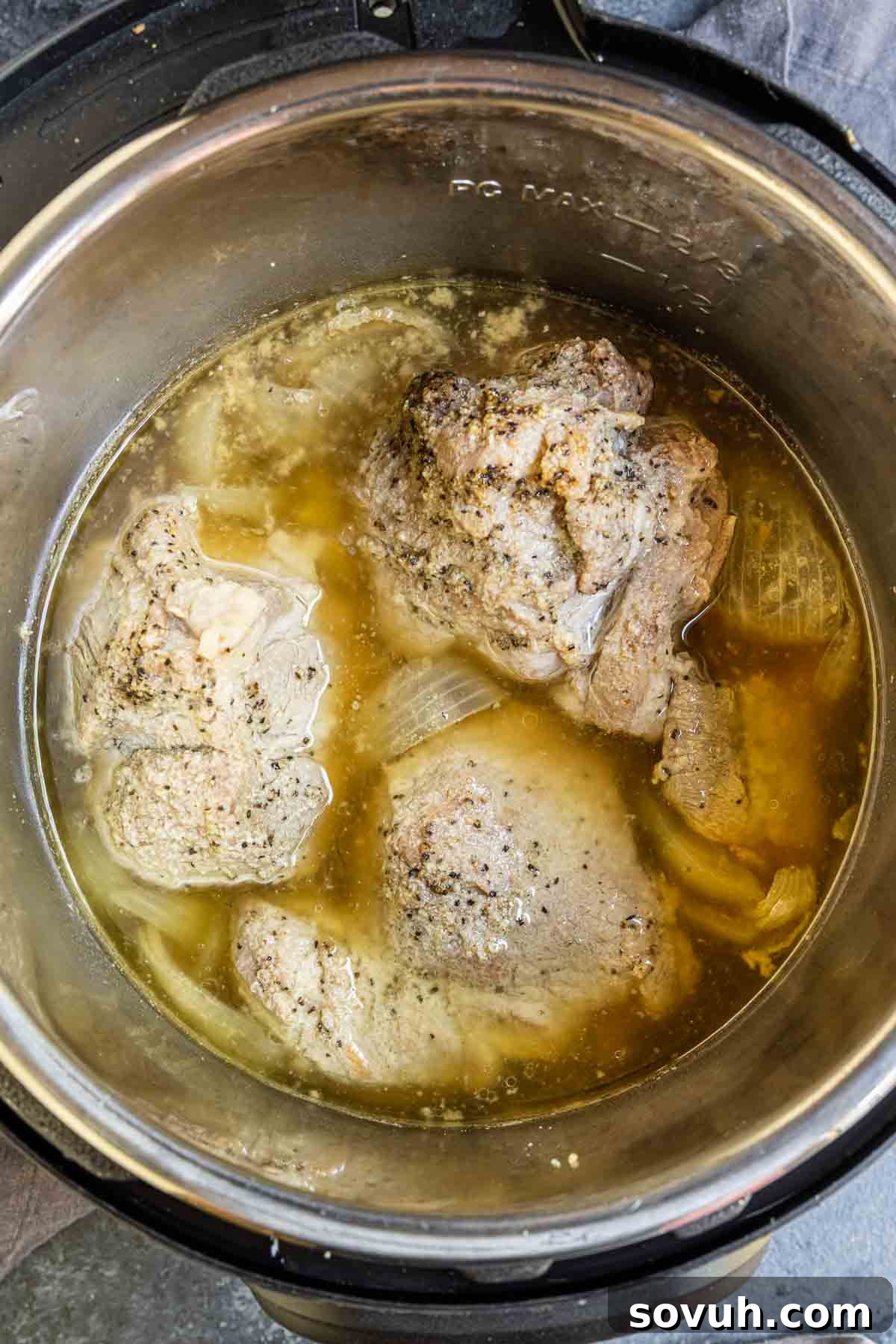Instant Pot Pork Roast cooking inside the Instant Pot
