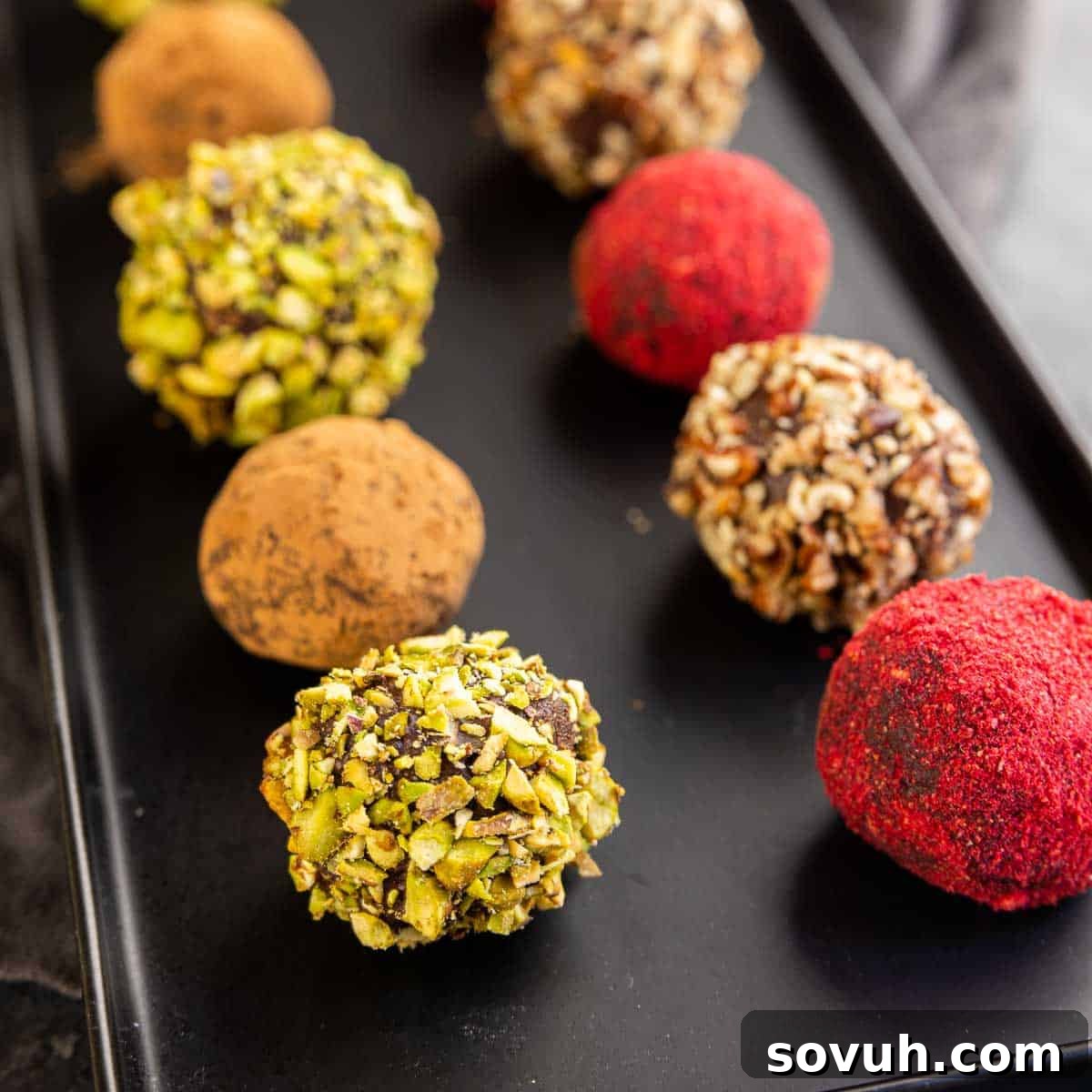 Decadent homemade Dark Chocolate Truffles coated in chopped pistachios, ready to be enjoyed or gifted.