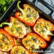 Lasagna Stuffed Peppers in black dish