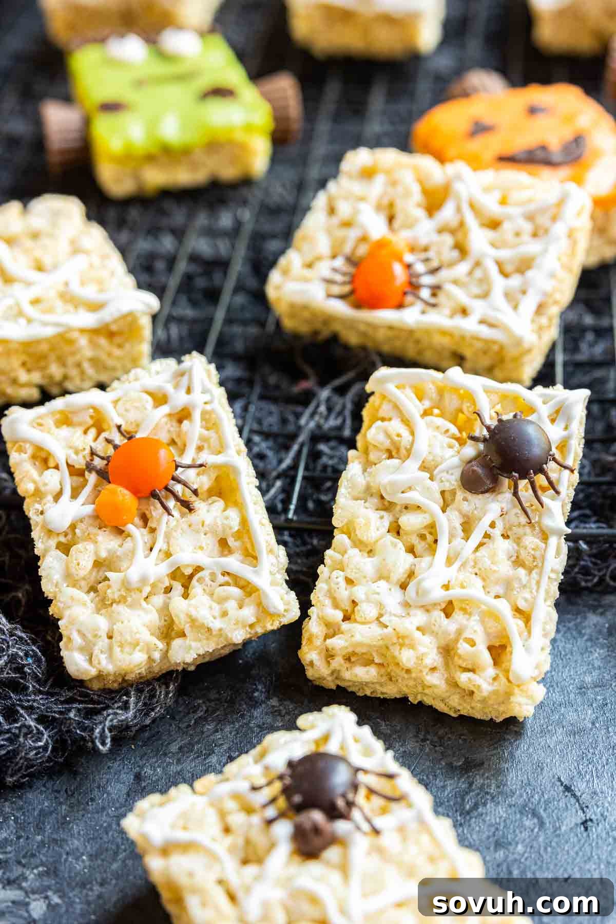A spooky Spider Rice Krispies Treat featuring a candy web and a chocolate spider body.