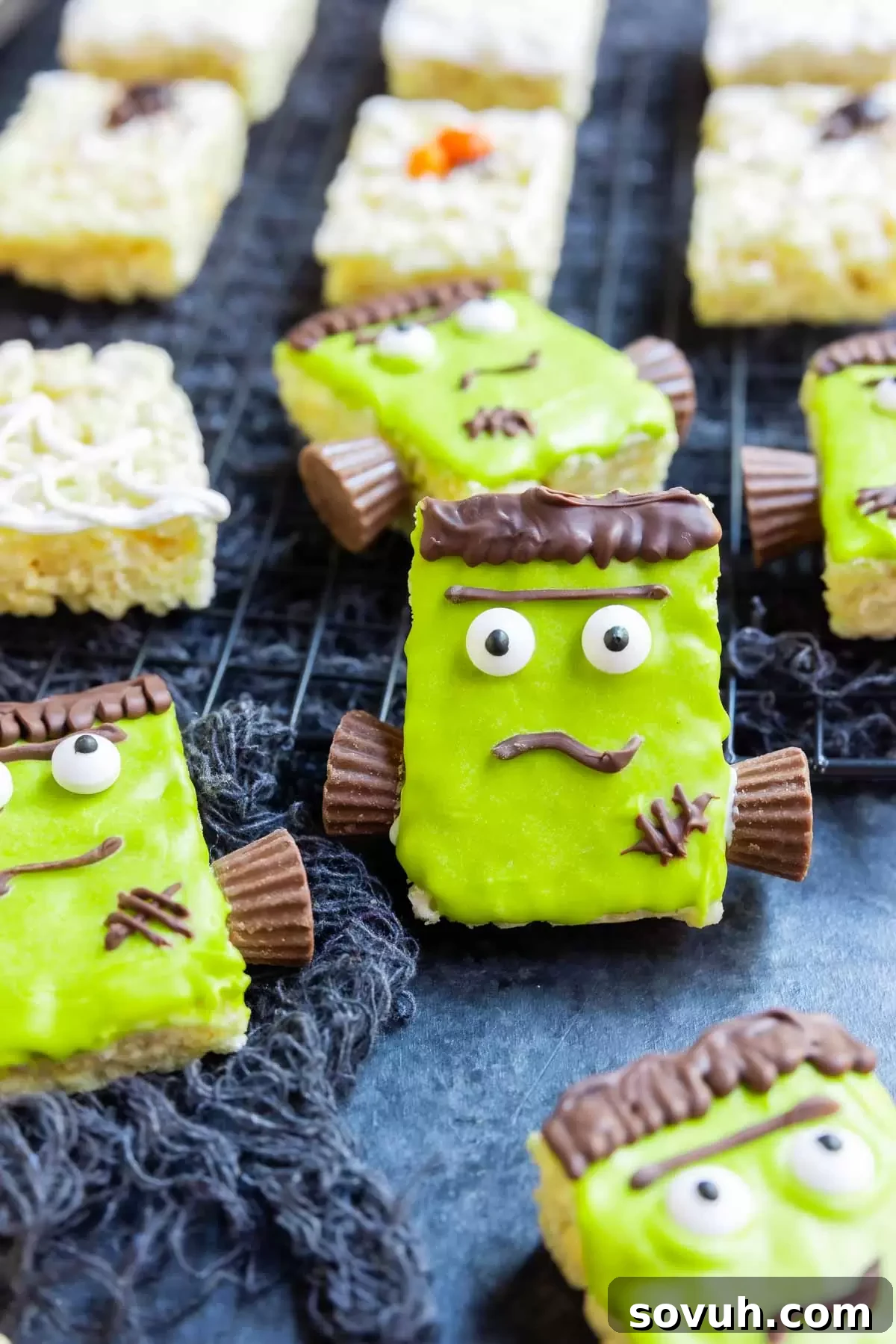 Another view of a Frankenstein Rice Krispies Treat, showing off its green frosting and chocolate details.