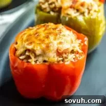 Instant Pot Stuffed Peppers on black plate