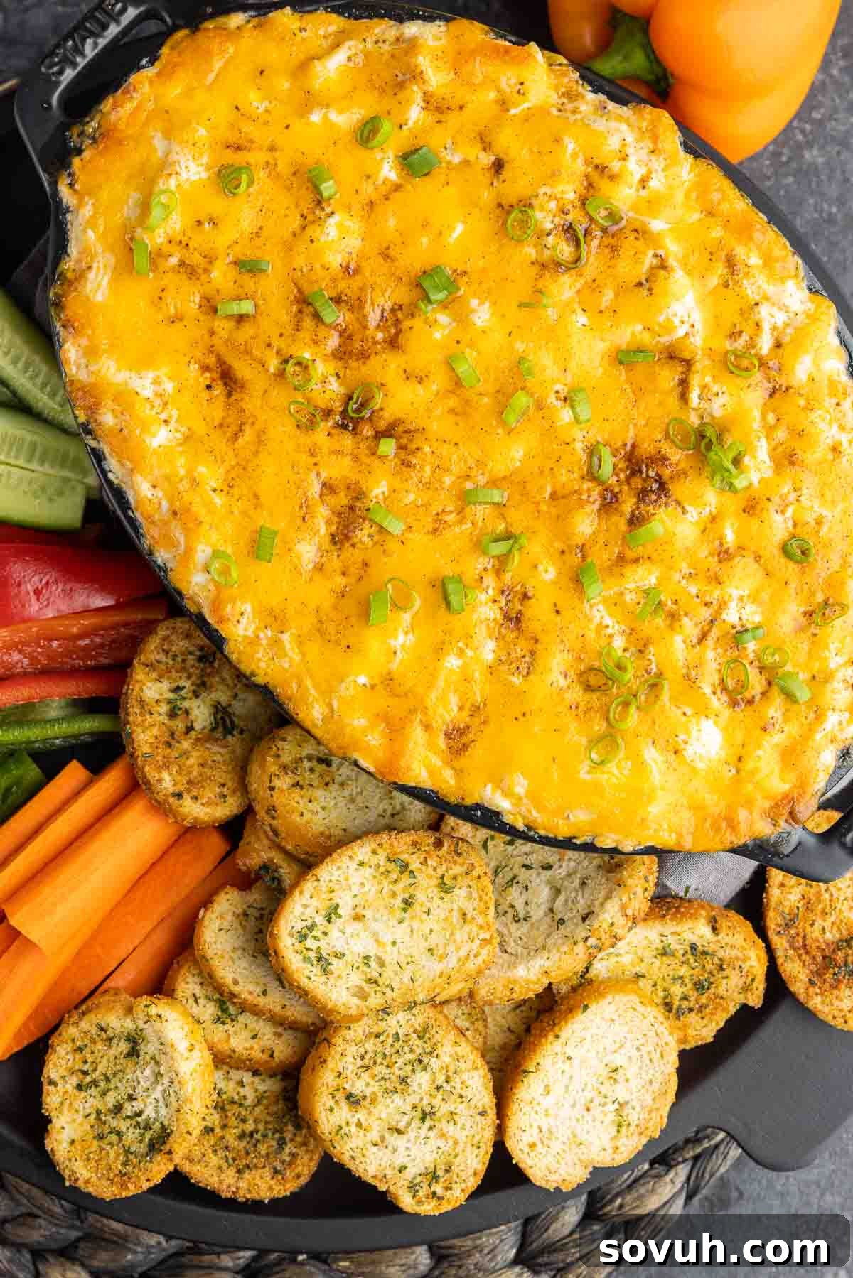 hot Maryland crab dip with fresh veggies and crostinis