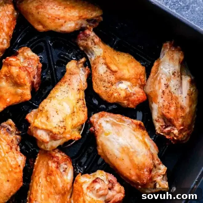 Air Fryer Chicken Wings in a air fryer basket